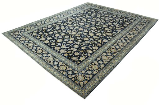 Close-up detail of 2000s Kashan rug from Iran / Persia showing Wool weave