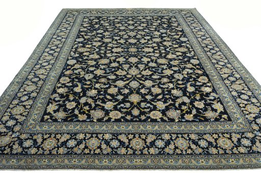Surface texture of 2000s Kashan rug with natural Wool and intricate pattern