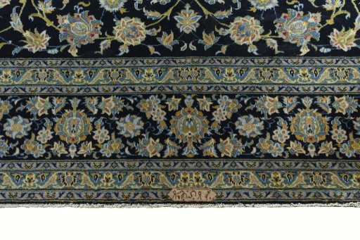 Close-up detail of 2000s Kashan rug from Iran / Persia showing Wool weave
