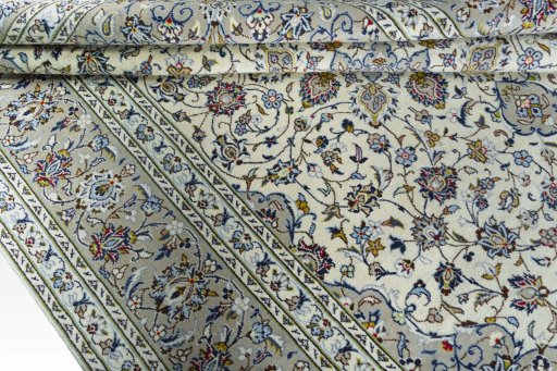 Close-up detail of 2000s Kashan rug from Iran / Persia showing Wool weave