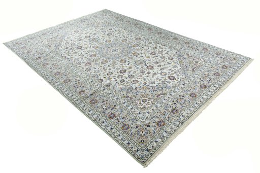 Corner detail of 2000s Kashan rug showing border pattern and Wool pile