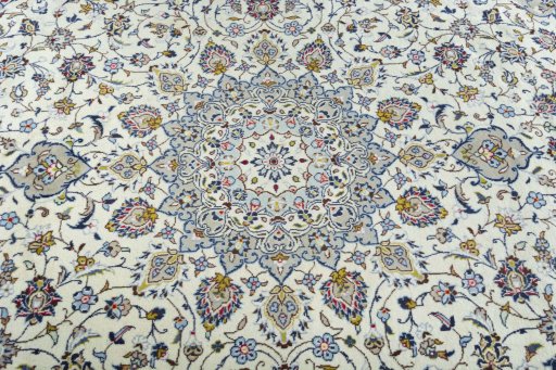 Central medallion detail of 2000s Kashan rug from Iran / Persia