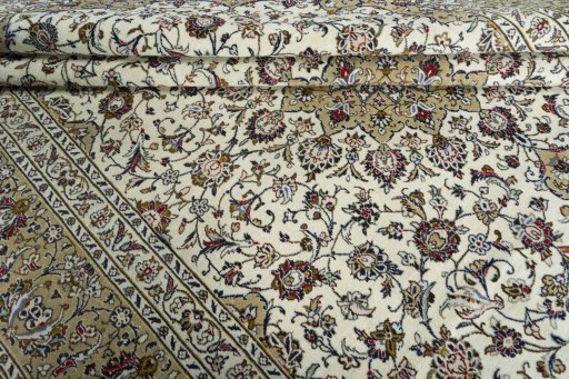Close-up detail of 2000s Kashan rug from Iran / Persia showing Wool weave