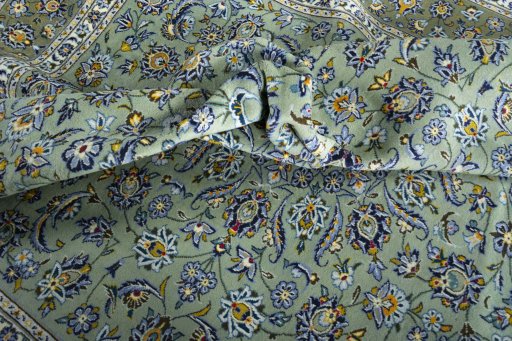 Surface texture of 2000s Kashan rug with natural Wool and intricate pattern