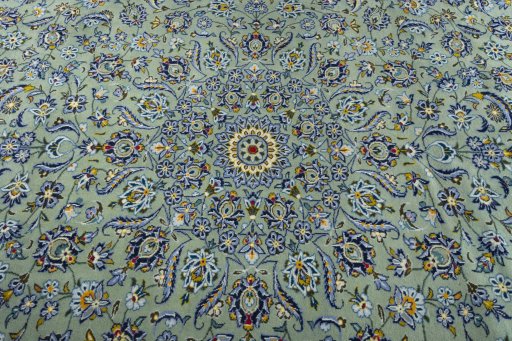 Central medallion detail of 2000s Kashan rug from Iran / Persia