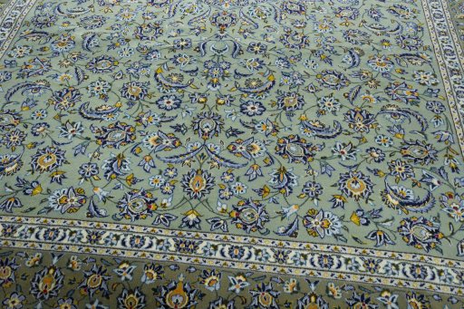 Close-up detail of 2000s Kashan rug from Iran / Persia showing Wool weave
