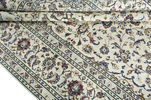 Close-up detail of 2000s Kashan rug from Iran / Persia showing Wool weave