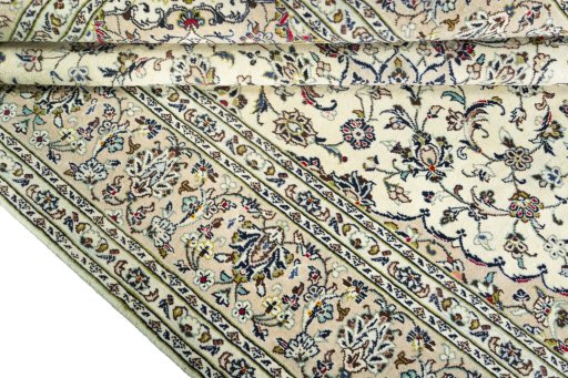 Close-up detail of New Kashan rug from Iran / Persia showing Wool weave