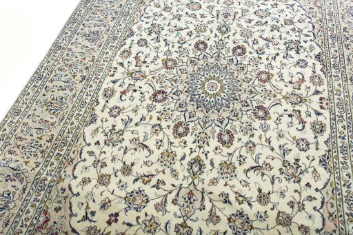 Backside of handmade New Kashan rug showing knot structure and weave density