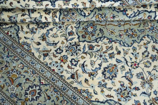 Close-up detail of 2000s Kashan rug from Iran / Persia showing Wool weave