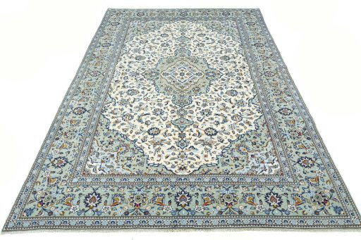 Surface texture of 2000s Kashan rug with natural Wool and intricate pattern