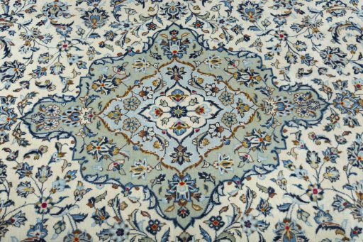 Central medallion detail of 2000s Kashan rug from Iran / Persia