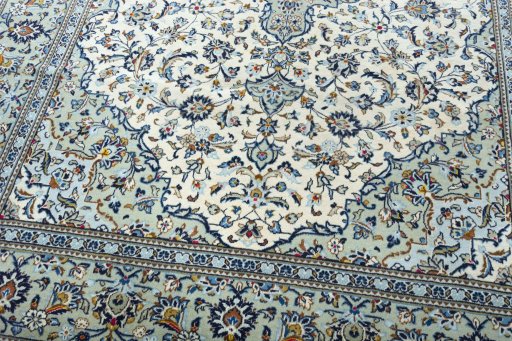 Close-up detail of 2000s Kashan rug from Iran / Persia showing Wool weave