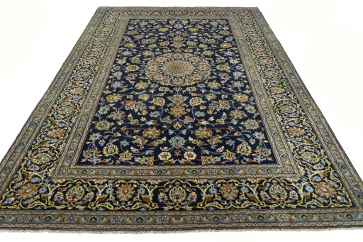Surface texture of 2000s Kashan rug with natural Wool and intricate pattern