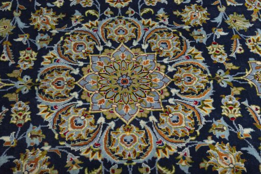 Central medallion detail of 2000s Kashan rug from Iran / Persia