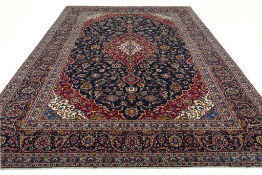 Surface texture of 2000s Kashan rug with natural Wool and intricate pattern