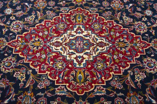 Central medallion detail of 2000s Kashan rug from Iran / Persia