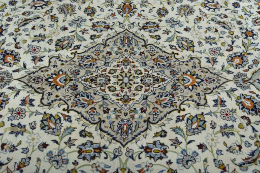 Central medallion detail of 2000s Kashan rug from Iran / Persia