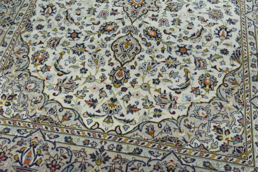 Close-up detail of 2000s Kashan rug from Iran / Persia showing Wool weave