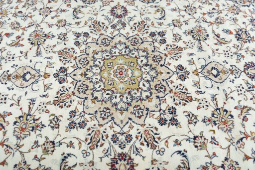 Central medallion detail of 2000s Kashan rug from Iran / Persia