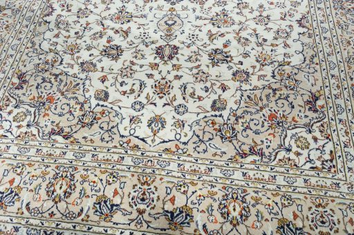 Close-up detail of 2000s Kashan rug from Iran / Persia showing Wool weave