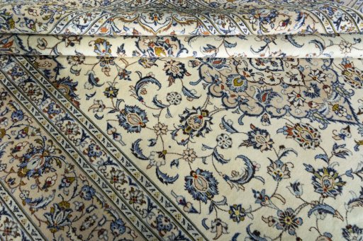Close-up detail of 2000s Kashan rug from Iran / Persia showing Wool weave