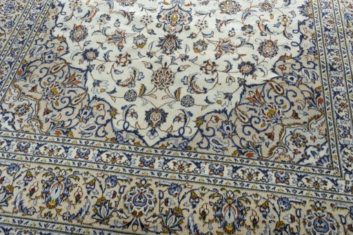 Central medallion detail of 2000s Kashan rug from Iran / Persia