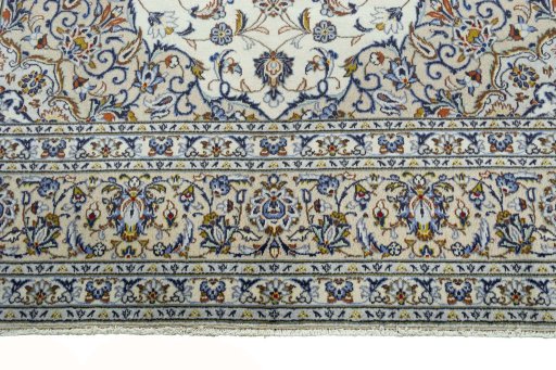 Close-up detail of 2000s Kashan rug from Iran / Persia showing Wool weave