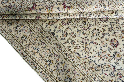 Close-up detail of 2000s Kashan rug from Iran / Persia showing Wool weave