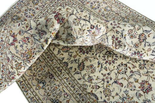 Surface texture of 2000s Kashan rug with natural Wool and intricate pattern