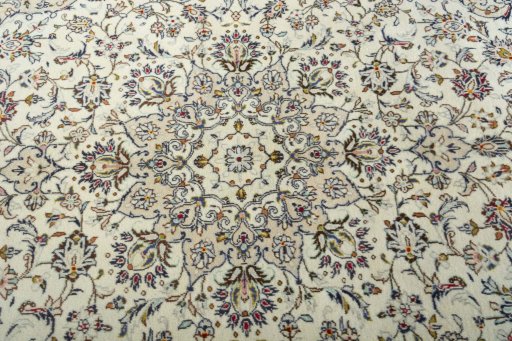 Central medallion detail of 2000s Kashan rug from Iran / Persia
