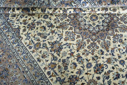 Close-up detail of New Kashan rug from Iran / Persia showing Wool weave