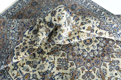 Surface texture of New Kashan rug with natural Wool and intricate pattern