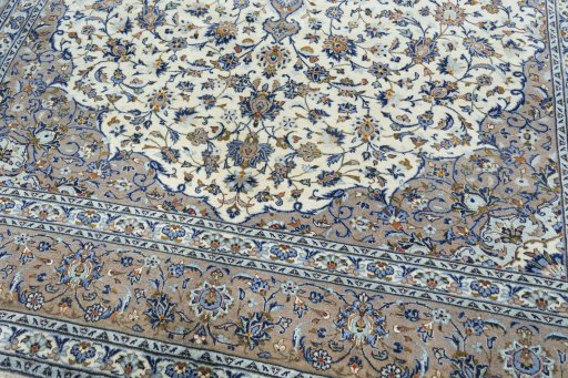 Close-up detail of New Kashan rug from Iran / Persia showing Wool weave