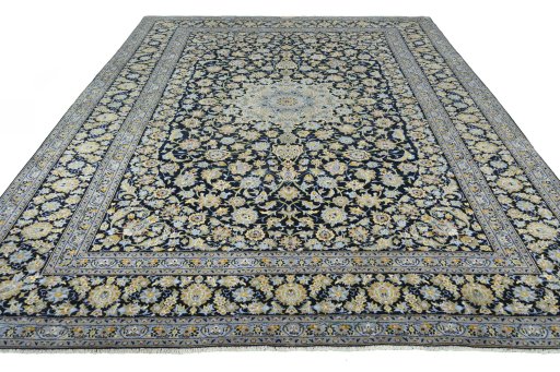 Surface texture of 2000s Kashan rug with natural Wool and intricate pattern