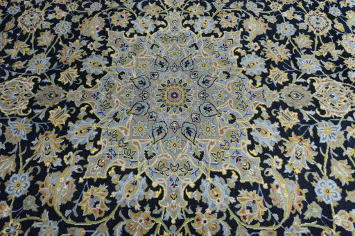 Central medallion detail of 2000s Kashan rug from Iran / Persia