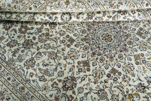 Close-up detail of 2000s Kashan rug from Iran / Persia showing Wool weave