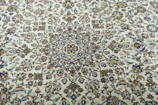 Central medallion detail of 2000s Kashan rug from Iran / Persia