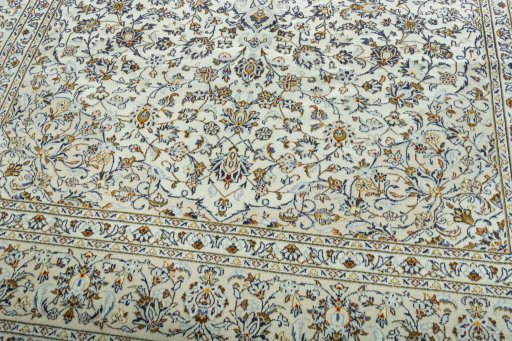 Close-up detail of 2000s Kashan rug from Iran / Persia showing Wool weave