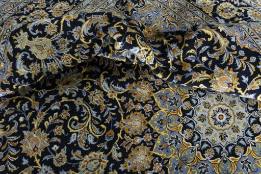 Surface texture of 2000s Kashan rug with natural Wool and intricate pattern