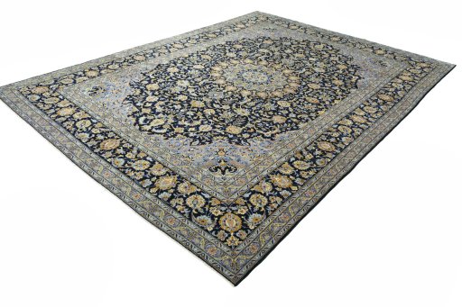 Corner detail of 2000s Kashan rug showing border pattern and Wool pile