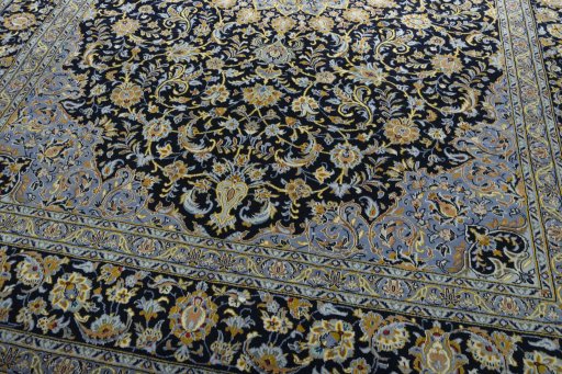 Close-up detail of 2000s Kashan rug from Iran / Persia showing Wool weave