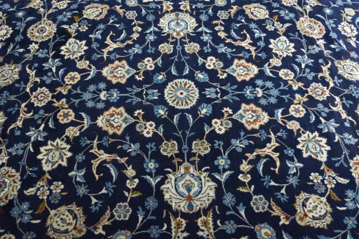 Central medallion detail of 2000s Kashan rug from Iran / Persia