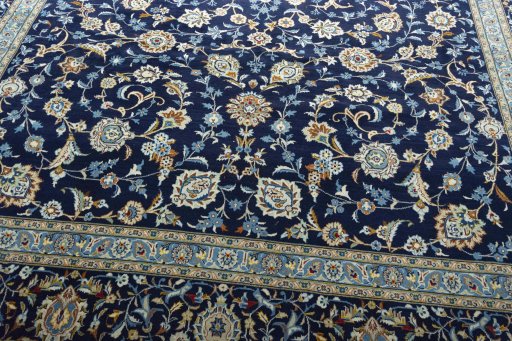 Close-up detail of 2000s Kashan rug from Iran / Persia showing Wool weave