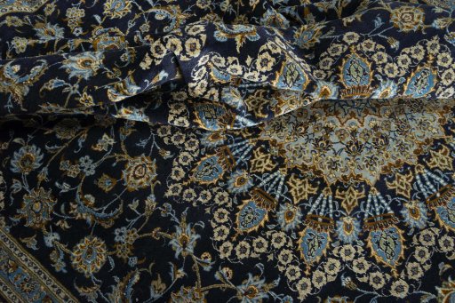 Surface texture of 2000s Kashan rug with natural Wool and intricate pattern