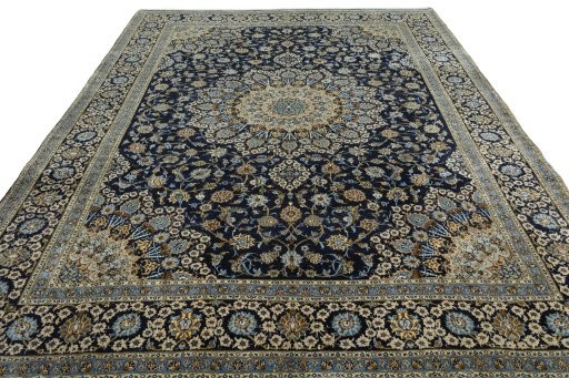 Surface texture of 2000s Kashan rug with natural Wool and intricate pattern
