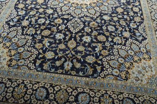 Close-up detail of 2000s Kashan rug from Iran / Persia showing Wool weave