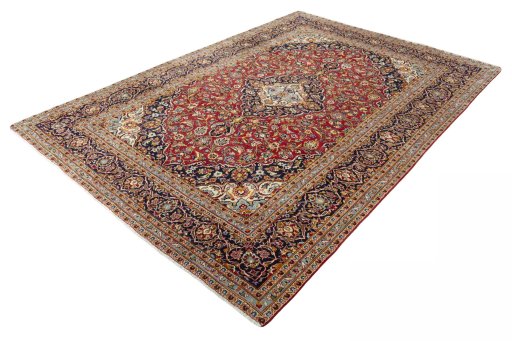 Corner detail of 2000s Kashan rug showing border pattern and Wool pile