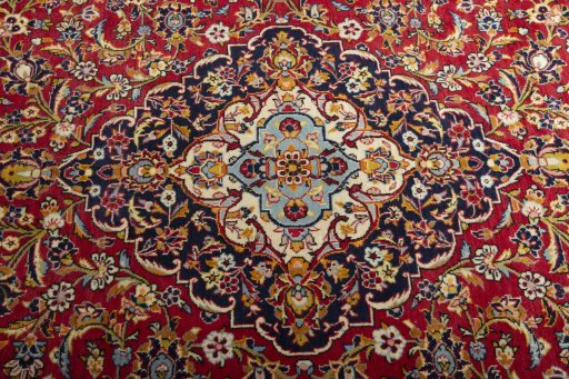 Central medallion detail of 2000s Kashan rug from Iran / Persia