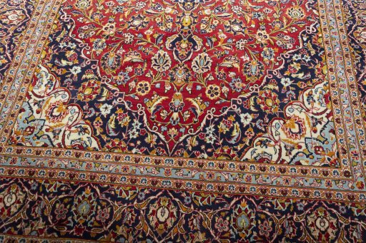 Close-up detail of 2000s Kashan rug from Iran / Persia showing Wool weave